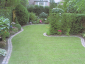 Rolled turf, also known as ready-made turf, is a high-quality natural product. Rolled turf is healthy and strong from day one - area with border.